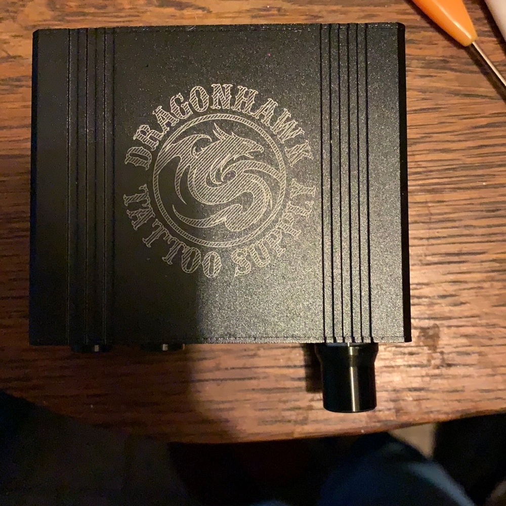 Dragon hawk tattoos gun